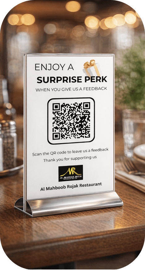 Branded QR standee at restaurant table for review collection